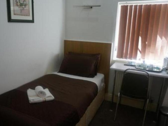 Hotel The Cotswold à Nottingham Chambre photo